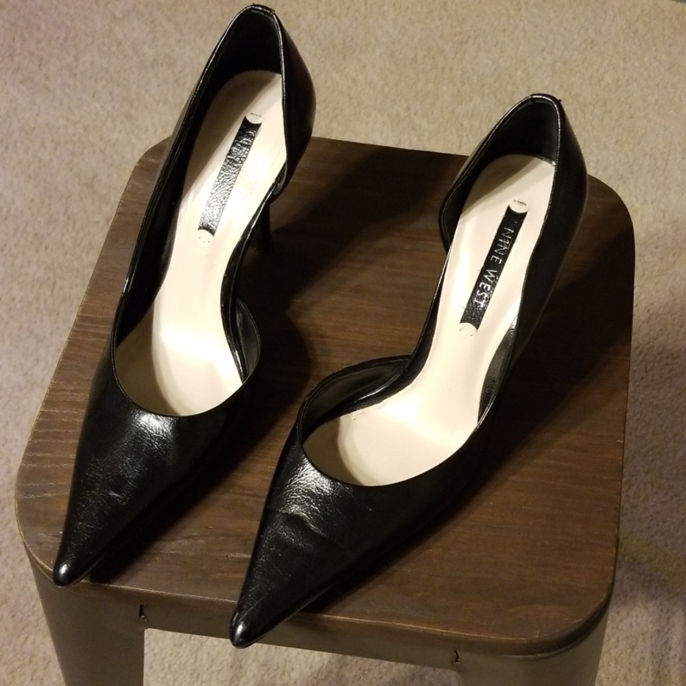 Black leather pumps